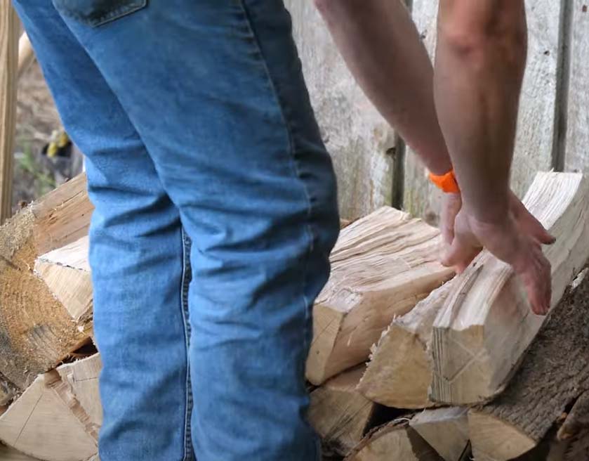 Man stacking firewood